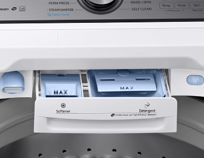 Open detergent drawer of a Samsung washing machine showing compartments for softener and detergent