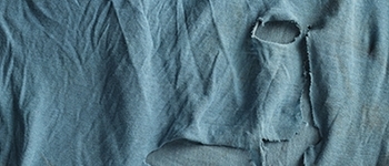 Torn teal colored shirt