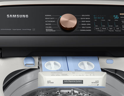 The auto dispense system open on a Samsung washing machine.