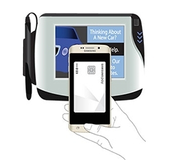 A Galaxy phone positioned in front of a payment terminal for MST payment.