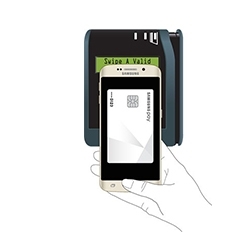 A Galaxy phone positioned near a card reader for NFC payment.