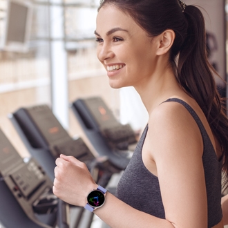 Woman running with a Galaxy Watch on