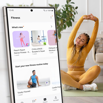 Woman stretching with the Fitness app open on a Galaxy S24 Ultra