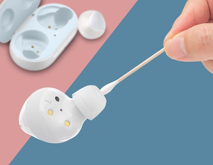 Galaxy Buds+ being cleaned with earbuds with case on the background