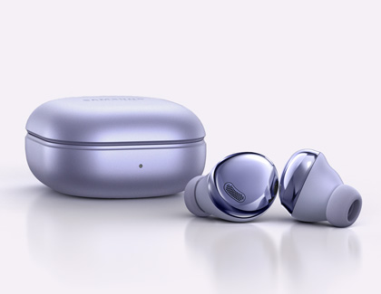 A pair of Galaxy Buds Pro earbuds next to the charging case