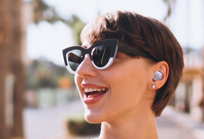 Woman listening to audio on Samsung Galaxy Buds2 Pro