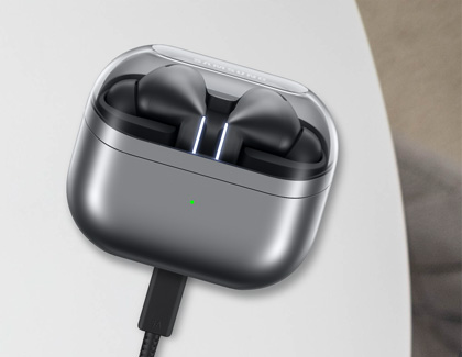 Galaxy Buds3 Pro being charged using a USB-C cable