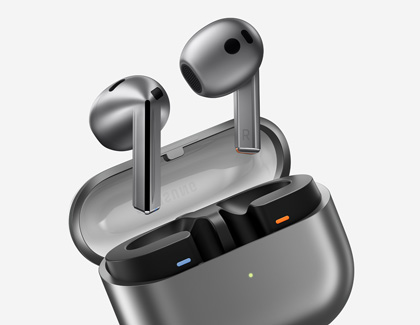 Galaxy Buds3 earbuds placed in an open charging case, displaying the earbuds and their compact design.