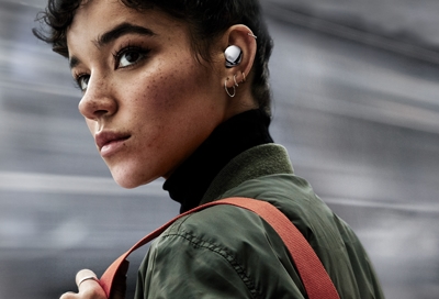 Woman listening to audio on Samsung Galaxy Buds Pro 