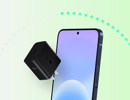 A dark blue Galaxy A57 showing its front display with a black Super Fast Charging wall masonry plug floating in front of it.