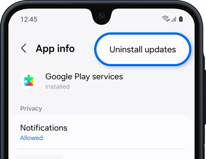 Samsung phone app info screen with 'Uninstall updates' option highlighted for Google Play services.