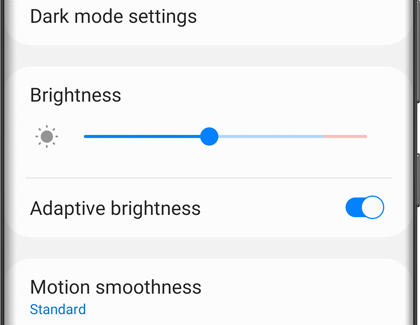 A list of Display settings with Brightness slider on a Galaxy phone
