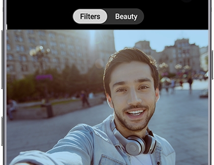 Camera in Selfie mode with filter options displayed