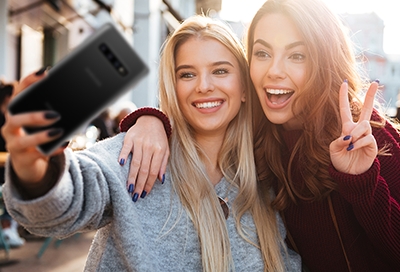 Two Girls taking a selfie with Galaxy S10