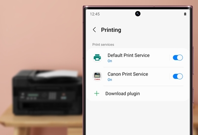 Galaxy S22 Ultra displaying print settings next to a printer