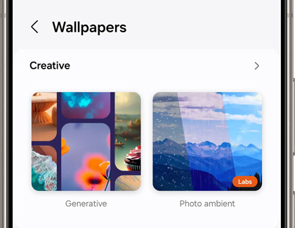 A smartphone screen displaying wallpaper options under the 'Creative' section, including 'Generative' and 'Photo ambient.'