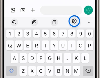 Settings icon highlighted on the top of the keyboard