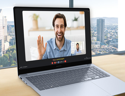 A Man video chatting with a man on a Samsung laptop