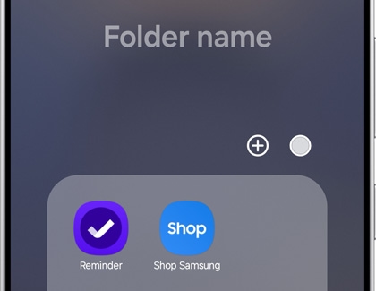 Galaxy S25 Ultra displaying a folder creation screen with two apps, Reminder and Shop Samsung, inside the folder.