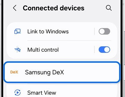 A Galaxy S25 showing the Connected devices menu with the Samsung DeX option highlighted by a blue rounded box.