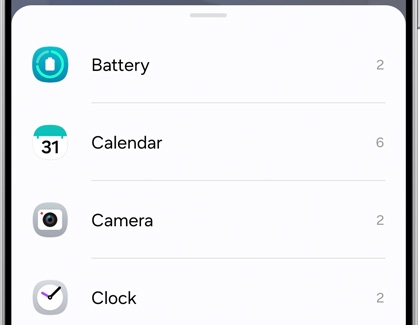 List of widgets such as Battery, Calendar, Camera, and Clock.