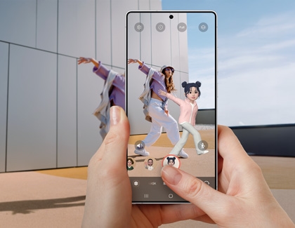 A person using a Galaxy S25 Ultra to capture a photo with an augmented reality avatar dancing alongside a real person