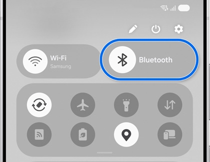 Bluetooth icon highlighted in Quick Settings.