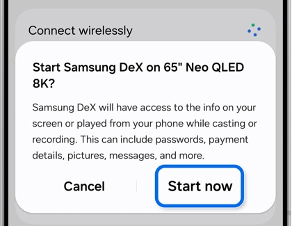 Galaxy S25 Ultra displaying a prompt to start Samsung DeX on a 65-inch Neo QLED 8K with Start now highlighted.