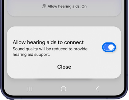 A Galaxy S26 screen showing a pop up to allow hearing aids to connect with the toggle switch highlighted in a blue circle.