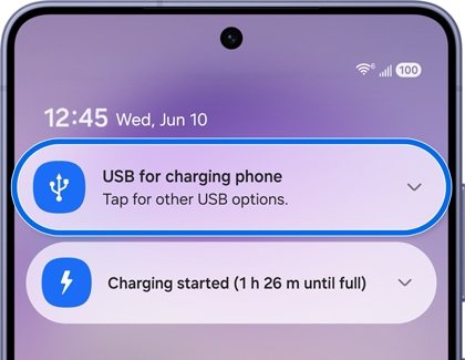 A Galaxy S26 Ultra screen showing a notification panel with the USB for charging phone option highlighted in blue.
