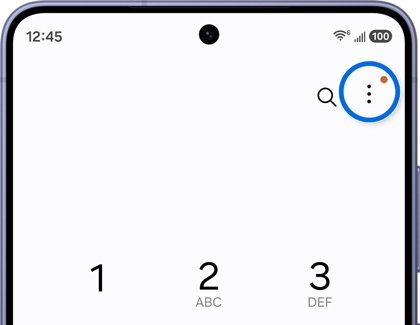 Phone app screen with the More options icon highlighted in the top right corner.