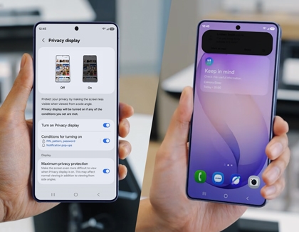 Two hands holding Galaxy S26 Ultra phones, one showing privacy display settings and the other showing a purple home screen with a dark notification.