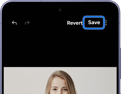 A Galaxy phone showing the Gallery editor with a woman's photo and Revert and Save buttons at the top, Save highlighted in blue.
