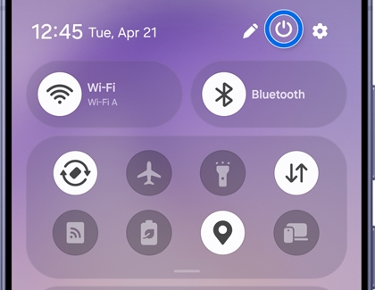 Quick Settings panel with the Power icon highlighted.