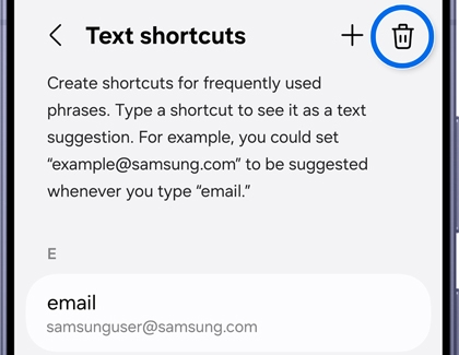 Text shortcuts menu with a created shortcut listed and the bin icon highlighted.