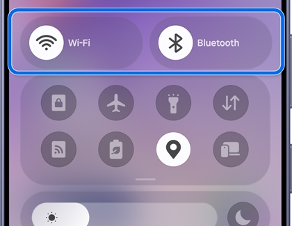 A Galaxy phone screen showing the Quick Settings panel with the Wi-Fi and Bluetooth options highlighted.