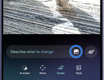 A Galaxy S26 phone screen showing an image icon highlighted in blue within the text prompt field.