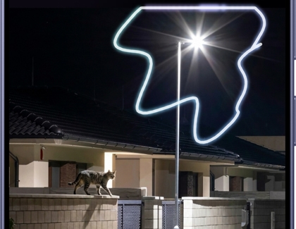 A circular area drawn around a light streak in a photo.