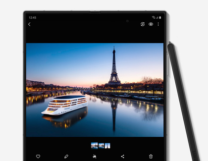 Galaxy Z Fold6 displaying a picture of the eiffel tower on the main screen alongside the S Pen Fold Edition
