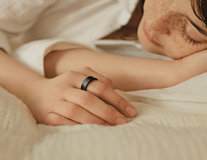 A Woman sleeping while wearing a Galaxy Ring