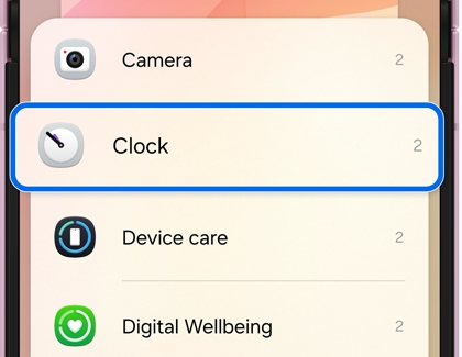 A widget selection menu on a Galaxy phone with Clock highlighted in blue.