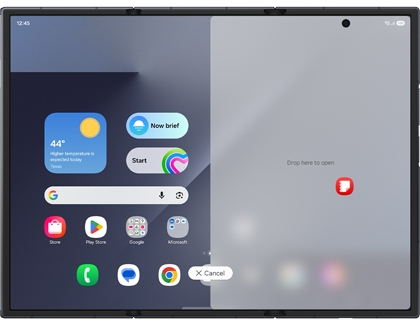 Home screen on the Galaxy Z TriFold with a Notes app icon being moved over a gray shaded area on the right.