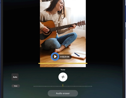 Audio eraser interface on a Galaxy Z Fold7 adjusting background noise in a video of a woman playing guitar.
