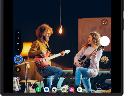 Galaxy Z Fold8 Ultra camera screen showing two musicians with a menu icon highlighted in blue.