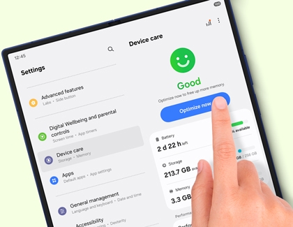 Galaxy Z Fold7 in tablet mode with the Device care screen open and a finger about to tap Optimize now.