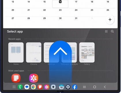 Swipe gesture being used on the Galaxy Z Fold7 to move an app into the top half of the screen for split screen view.