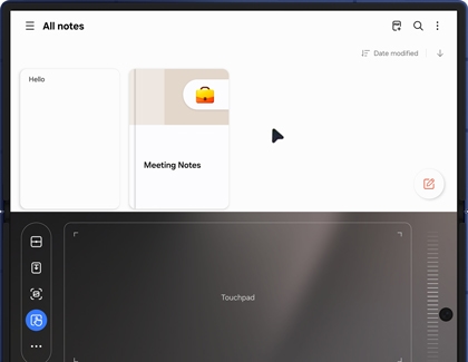 Flex mode touchpad on the Galaxy Z Fold7 with a visible cursor and notes app open on the upper screen.