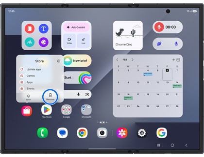 A Galaxy Z TriFold showing an app pop up menu with the Remove option highlighted by a blue circle to delete a widget from the home screen.