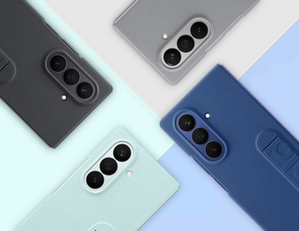 Four Galaxy Z Fold7 phones shown with cases in black, gray, mint, and blue, each featuring a built-in grip.