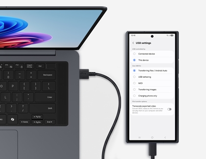 Galaxy Z TriFold connected to a laptop via a black cable showing USB settings with Transferring files selected.